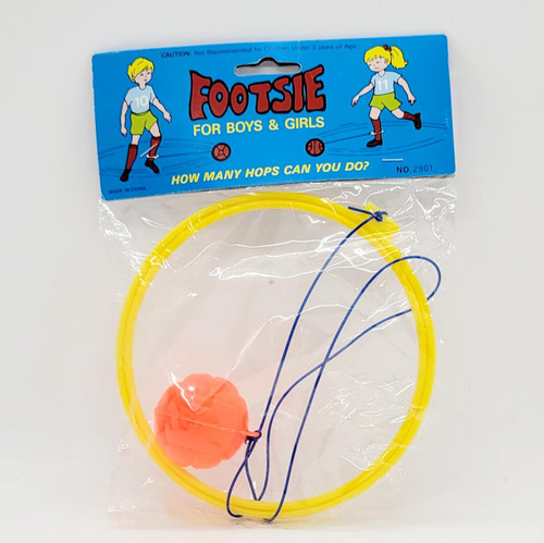 Unbranded Vintage Footsie For Boys & Girls Game, yellow plastic ring with a ball and ropes for jumping game.