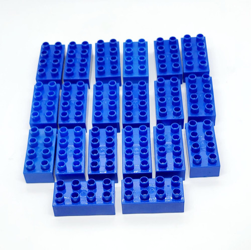MEGA BLOKS Mattel Mega Bloks 2 X 4 Lot of 20 Blue Blocks, a collection of 20 blue plastic building blocks arranged in four rows on a white background.