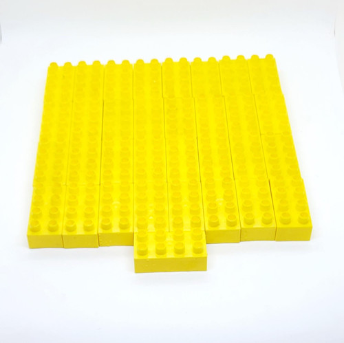 MEGA BLOKS Mattel Mega Bloks 2 X 4 Lot of 33 Yellow Blocks, a collection of 33 yellow building blocks suitable for children's construction toys.
