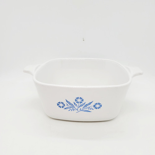 Corning Ware Petite Cornflower Blue 2 3/4 Cup Pan P-43-B, white ceramic casserole dish with blue floral design and two small handles.