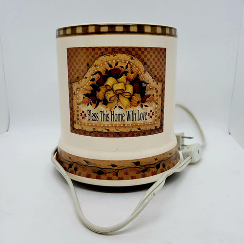 Crazy Mountain "Bless This Home With Love" Large Electric Jar Candle Melter, a decorative white ceramic candle warmer with floral design and the message "Bless This Home With Love" on the front.