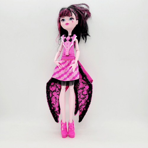 Monster High 2015 Ghoul to Bat Draculaura Doll, loose, detailed doll with pink and black bat wings and vibrant pink and black outfit.