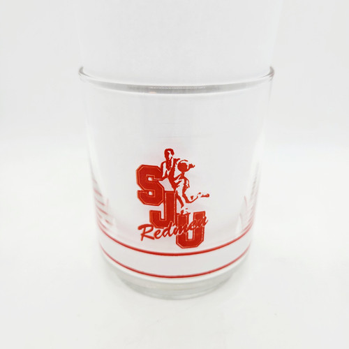 Getty NCAA Saint John's University Glass – Celebrate 10 Years of Big East Basketball, Vintage 4" Collectible, clear glass with red Saint John's logo featuring a basketball player, perfect for sports memorabilia collectors.