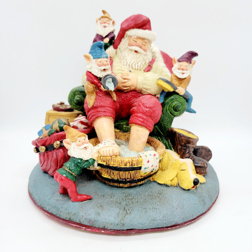 Santa Claus Soaking Feet and Pampered By Elves Figurine