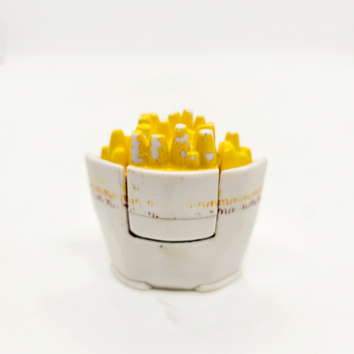McDonald's Happy Meal toy of 1989 Small Fries “Fry Bot” from Series 2 Galactic Robot Changeables.  "Fry Bot" is a small French fry that transform into a small robot. The series contains 8 different Food Changeables Galactic Robots and was available May 19-June 15, 1989.