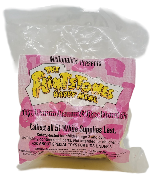 McDonald's Happy Meal toy of Betty and Bamm-Bamm with Roc Donald's from the 1994 The Flintstones series. Roc Donald's is based on the stone age version of McDonald's. The series contained 5 toys and was available June 3 - July 7, 1994.