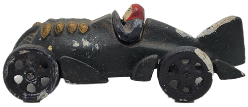 Vintage cast iron toy race car that is 6-inches long. We can not determine if this is a reproduction or original.