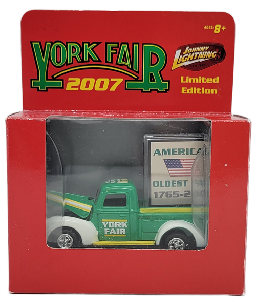 York Fair 2007 limited edition of 4000 Ford Pickup with sign 1:64 scale die-cast by Johnny Lightning.  The Ford Pickup truck is green with white trim with York Fair on the sides.  The bed of the truck has a large sign with America's Oldest Fair 1765 - 2007 in it.  The York Fair is America's Oldest Fair that began in 1765 in York, Pennsylvania.