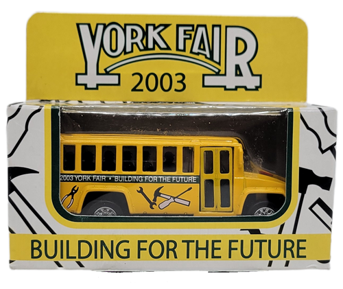 Yellow School Bus with Building for the future on the side limited edition 2003 York Fair souvenir produced by Matchbox and distributed by FairMasters.  The 1:64 scale school bus features York Fair building for the future on the sides and for ages 3 and up.