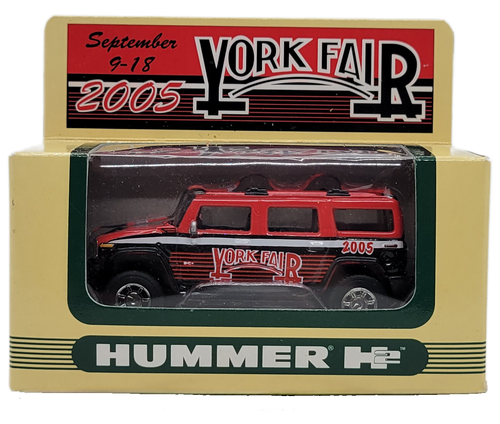 Red Hummer H2 limited edition 2005 York Fair souvenir produced by Fleer and distributed by FairMasters.  The 1:64 scale Hummer H2 is red with black strips and York Fair on the sides and roof.  The Hummer is for ages 14 and up.