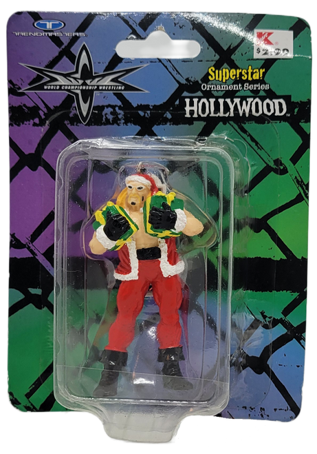 Trendmasters 1999 WCW Superstar ornament series Hollywood Hulk Hogan holding Christmas presents in each arm.  Hollywood Hogan stands 3-inches tall wearing a Santa suit, sunglasses and holding a green present with yellow ribbon in each arm.