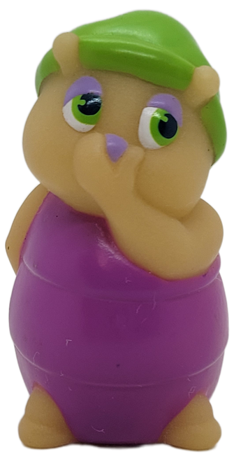 Hasbro 1987 second series of Glo Friends rubber toy figure of Glo Skunkbug.  Glo Skunkbug stands 3-inches tall and has purple top and a green stocking hat. Six new characters were introduced this year along with re-releases of the original eight friends.