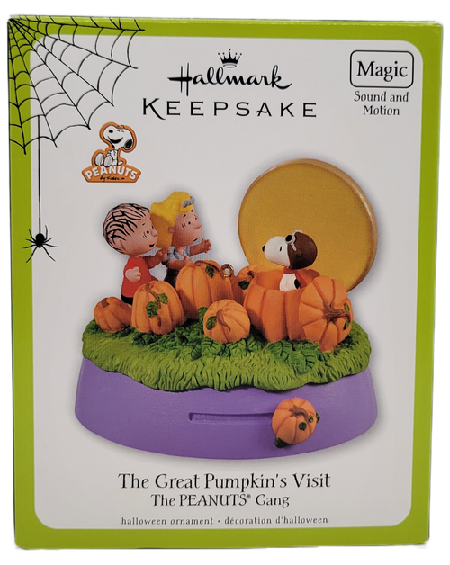 Hallmark Keepsake 2011 Halloween ornament The Great Pumpkin's Visit, The Peanuts Gang.  The ornament has Red Barron Snoopy, Linus and Sally in a pumpkin patch.  Snoopy pops up through a pumpkin.