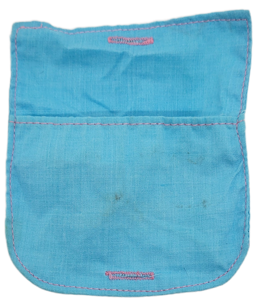 Hasbro 1986 first series of Glo Friends rubber toy figure of Glo Butterfly's sleeping bag.  The sleeping bag is light blue and is 4-inches long and 3.25-inches wide. Eight characters were introduced that year.