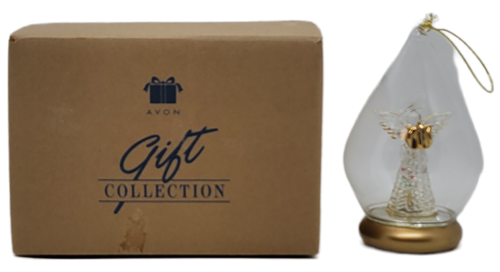 AVON 1999 Gift Collection brilliant spun glass ornament with music and light Angel.  The 5-inch ornament features a glass angel inside a glass tear drop shaped enclosure.  The angel is wearing a gold halo and holding a gold harp.