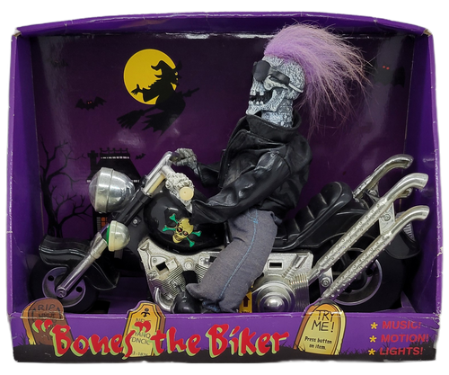 PAC (BVI) 2006 "Bones" the biker Halloween animatronic with music, motion and lights.  The bike is a skeleton wearing jeans and a black leather jacket riding a black motorcycle and dual exhaust.  The bike is 13-inches long and 10-inches tall.
