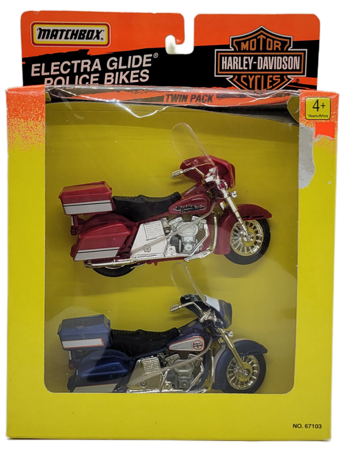 MATCHBOX 1995 Harley-Davidson Motorcycles Electra Glide police bikes twin pack No. 67103.  The twin set features a red and blue Electra Glide police bikes.