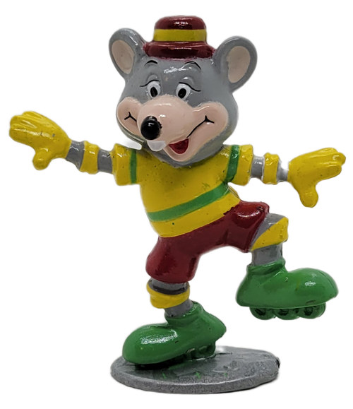 Showbiz Pizza Time 1994 PVC figure of Chuck E. Cheese rollerblading.  The figure features Chuck E Cheese rollerblading wearing a yellow shirt with green trim, red shorts, green rollerblades and yellow protective gear.  Chuck E. Cheese figure stands 2.75-inches tall.