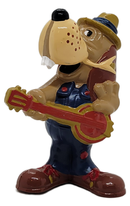 Showbiz Pizza Time 1994 PVC figure of Chuck E. Cheese's Jasper T. Jowls. Jasper the dog is wearing blue Bibb overalls, brown hat while playing guitar. Jasper's figure stands 2.5-inches tall.