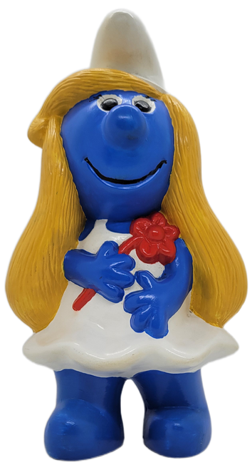 Vintage 11-inches tall ceramic figurine of Smurfette from the Smurfs.  The Smurfette is hand painted features Smurfette holding a red flower and wearing her white hat and white dress with her iconic blonde hair.