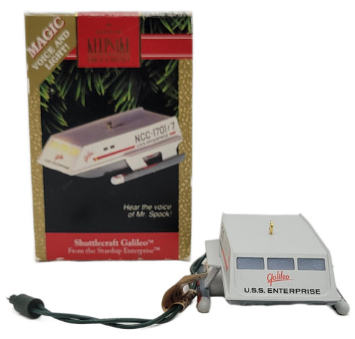 Hallmark Keepsake Ornament 1992 Star Trek Shuttlecraft Galileo, a collectible Christmas ornament modeled after the USS Enterprise shuttlecraft in Star Trek, featuring a detailed white design with windows and labeled 'Galileo' and 'U.S.S. ENTERPRISE'.