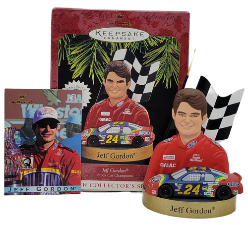 Hallmark Keepsake ornament 1997 Stock Car Champions collector series of Jeff Gordon.  Jeff Gordon is a NASCAR driver of the #24 Dupont car.  The ornament features the Dupont Chevrolet car in front of Jeff Gordon and a checkered flag.  The ornament also comes with exclusive trading card.