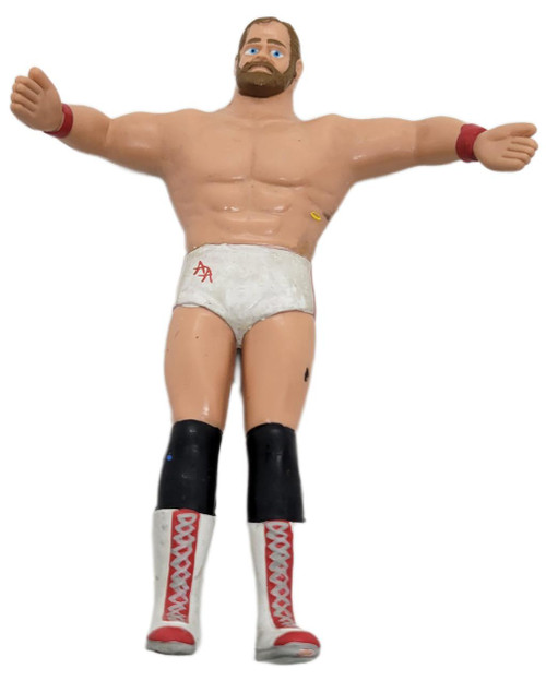 Just Toys 1990 Twistables WCW Arn Anderson Bendable Figure (Loose), a poseable wrestling action figure with detailed muscular body, wearing white wrestling trunks and colorful knee-high boots.