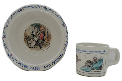 Eden Toys Eden Peter Rabbit And Friends F. Warne Bowl And Cup Melamine Set, illustrated ceramic bowl and cup with Peter Rabbit characters for children.