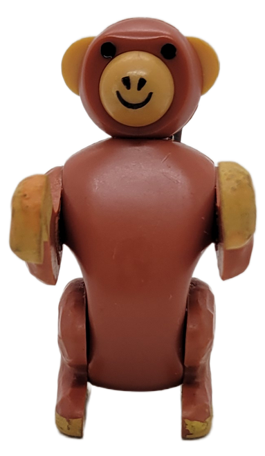 Fisher-Price Original Little People monkey.  The monkey has jointed arms and legs with head that moves side to side.
