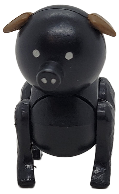 Fisher-Price Original little People Pudgy the Pig toy figure.  The figure was available in #915 Play Family Farm set.  This 1972-1975 version is black with dark grayish-brown ears and stamped Hong Kong on bottom.