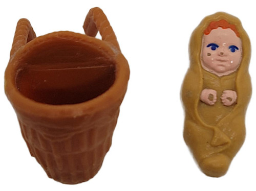 TONKA Tonka 1988 Willow: Baby Elora Danan in Basket 1" Figure (Loose), vintage toy figurine of a baby Elora Danan in a basket, made by Tonka, with detailed facial features and a basket design, collectible doll accessory.