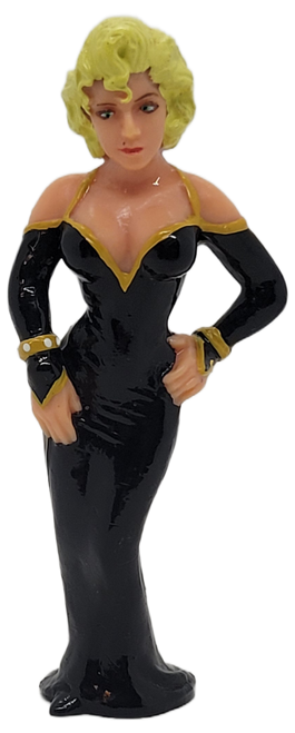 Dick Tracy's Breathless Mahoney, played by Madonna 3.5-inch tall PVC figure. Breathless Mahoney is an enigmatic barroom singer who has witnessed some of Caprice's crimes firsthand.  She is wearing a black evening gown with bare shoulders.