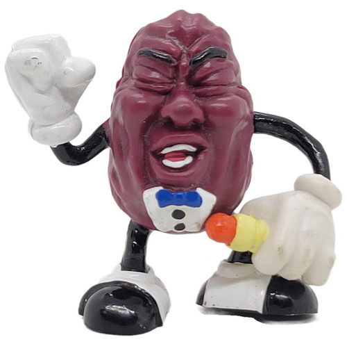 Applause California Raisins 1987 California Raisins Original Series Tiny Goodbite PVC Toy Figure, a small figurine of a raisin character dressed as a chef with a white chef's hat and shirt, black bow tie, and holding a turkey drumstick.