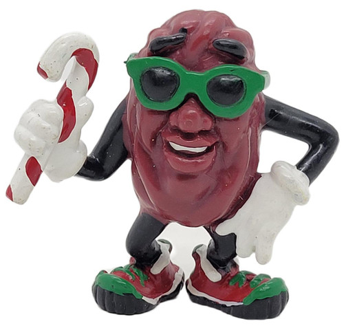 Applause California Raisins 1988 California Raisins Christmas Candy Cane Figure, a festive figurine of a raisin character wearing sunglasses, holding a candy cane, dressed in Christmas-themed shoes and gloves.