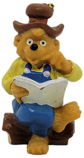 Applause The Berenstain Bears Papa Bear Reading 2.25" PVC Figure, detailed figurine of Papa Bear wearing a cowboy hat, yellow shirt, blue overalls, and reading a book.