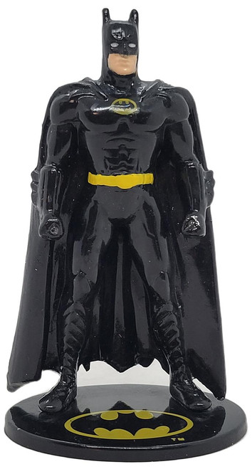 Applause 1992 DC Comics Batman 3.5 inch PVC Figure, detailed black Batman figurine with yellow belt, cape, and iconic Batman emblem on the base.