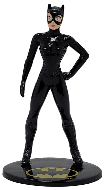 Applause 1992 DC Comics 3.5-inch tall figure of Catwoman from Batman. The PVC figure features Catwoman wearing her black suit and standing on a black base with Batman logo.