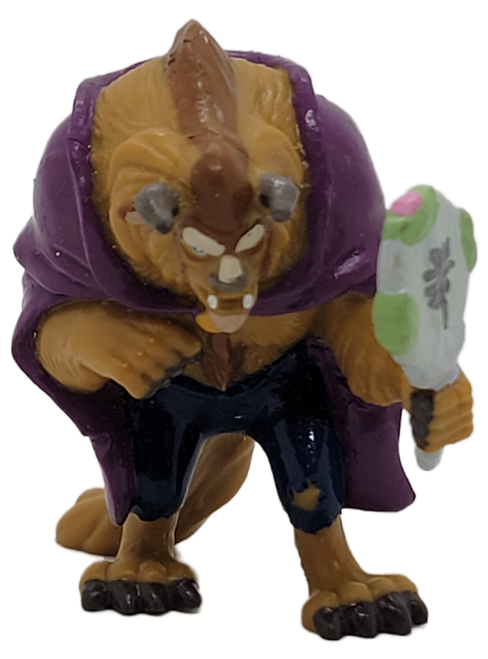 Disney's Beauty and the Beast 2.25-inch tall PVC figure of Beast. A pampered but dangerously grouchy prince transformed into a hideous beast as punishment for his cold-hearted and selfish ways.  Beast is wearing blue pants, purple cape and holding a mirror.