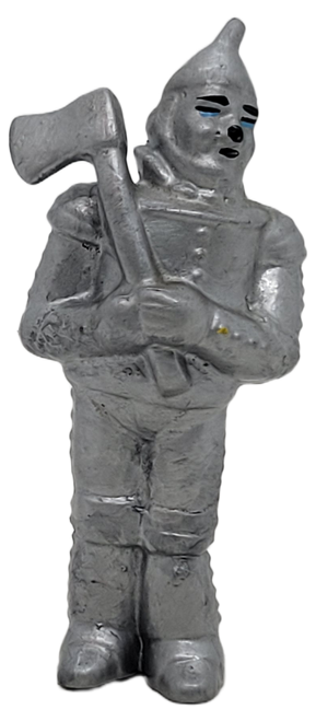 The Wizard of Oz 2.5-inch tall 1989 PVC figure of the Tin Man by Applause.  The Tin Man is holding his axe against his right shoulder while he looks to his left.