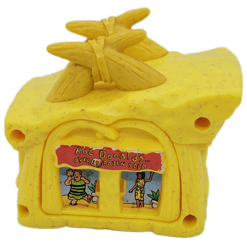 McDonald's Happy Meal Toy 1994 The Flintstones #2 Betty Bamm-Bamm Roc Donald's (No Car), yellow plastic toy featuring Betty and Bamm-Bamm Flintstone with a cartoon image of Flintstones characters on the front.