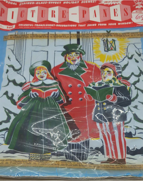 Arkow Lewis Frosties 1953 Picture-Panes Stained Glass Effect Christmas Carolers No. 200, vintage holiday decoration with colorful stained-glass style illustration of three singing Christmas carolers in festive attire.