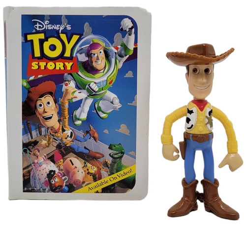 McDonald's Happy Meal Toy 1996 Disney Masterpiece Toy Story, toy figure of Sheriff Woody from Toy Story standing next to its packaging.