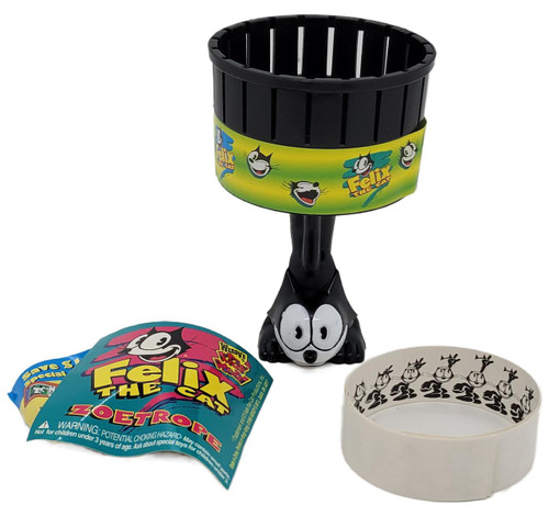 Felix the Cat Wendy's Kids Meal Toy 1996 Felix The Cat Zoetrope, a vintage black plastic zoetrope featuring Felix the Cat character and a curved white base with cartoon Felix illustrations.