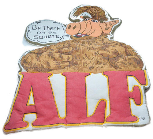 MDV Marketing 1987 ALF Soft Sculpture Art, featuring ALF, the character from the TV show, with a speech bubble saying 'Be There Or Be Square,' and the word 'ALF' in bold pink and yellow letters