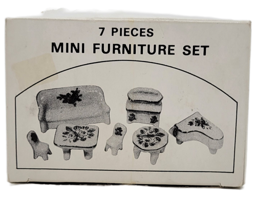 Vintage porcelain 7 piece mini furniture set Made in Japan.  The 1-inch tall set includes a sofa, piano, tables, chairs, and hutch with floral design.  The pieces can be used with doll house or just as miniature display.