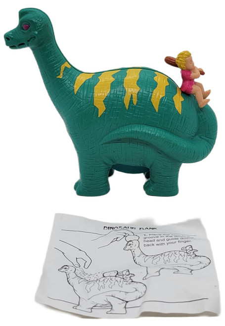 Wendy's Kids Meal Toy 1996 Club Cave Dino Bank (Loose), green dinosaur bank with a small girl figure sitting on its back and instruction sheet included.