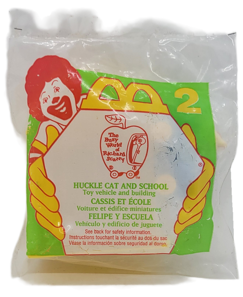 McDonald's Happy Meal toy of Huckle Cat and School from the 1995 The Busy World of Richard Scarry series.  Huckle Cat in a Crate Car with School building was number 2 in the series. In 1995, McDonald's Happy Meal had a premium toy line promoting the animated TV Show The Busy World of Richard Scarry. It consisted of four sets, each set had a vehicle and a building.  They were available September 1-30, 1995.