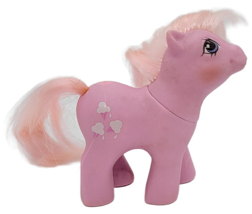 Hasbro 1987 My Little Pony G1 Babies with First Tooth Baby Lickety-Split, pink plastic pony toy with blonde mane and tail, featuring a cute face and cloud-shaped symbols on its body.