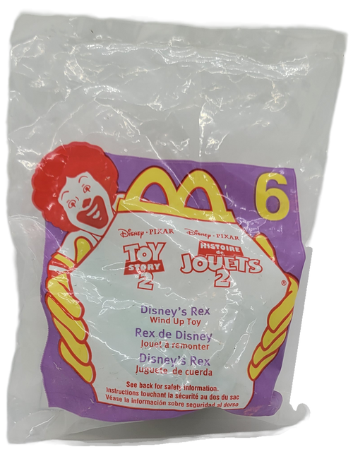 McDonald's Happy Meal toy of Disney's Rex from the 1999 Disney Pixar Toy Story 2 series of toys.  Rex is a green T-rex wind-up toy.  The line consisted of 20 different characters from the movie and were available November 26-December 30, 1999.
