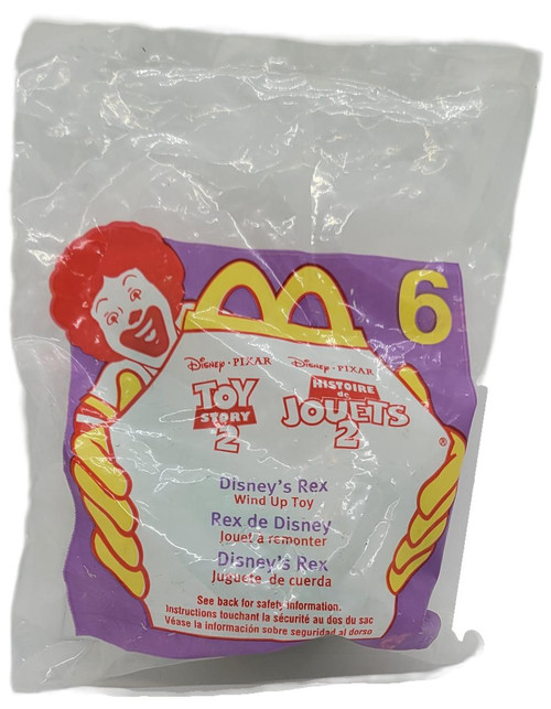 McDonald's Happy Meal Toy 1999 Toy Story 2, Disney's Rex wind-up toy in original packaging.